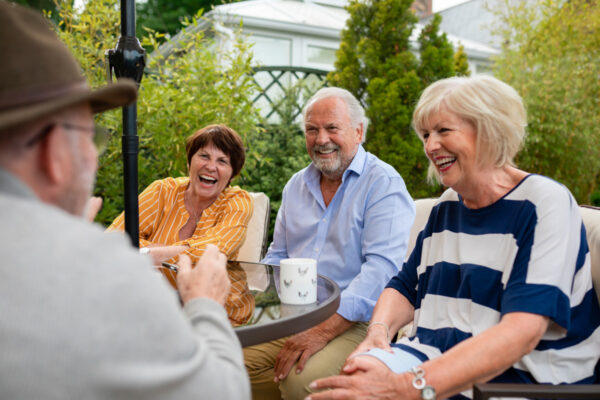 Friends Having a Laugh in the Garden