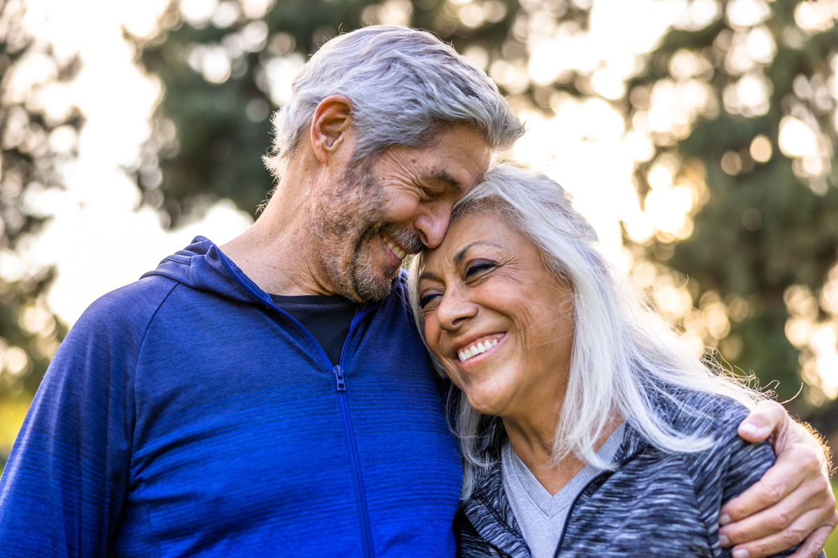 Senior couple walking together outside