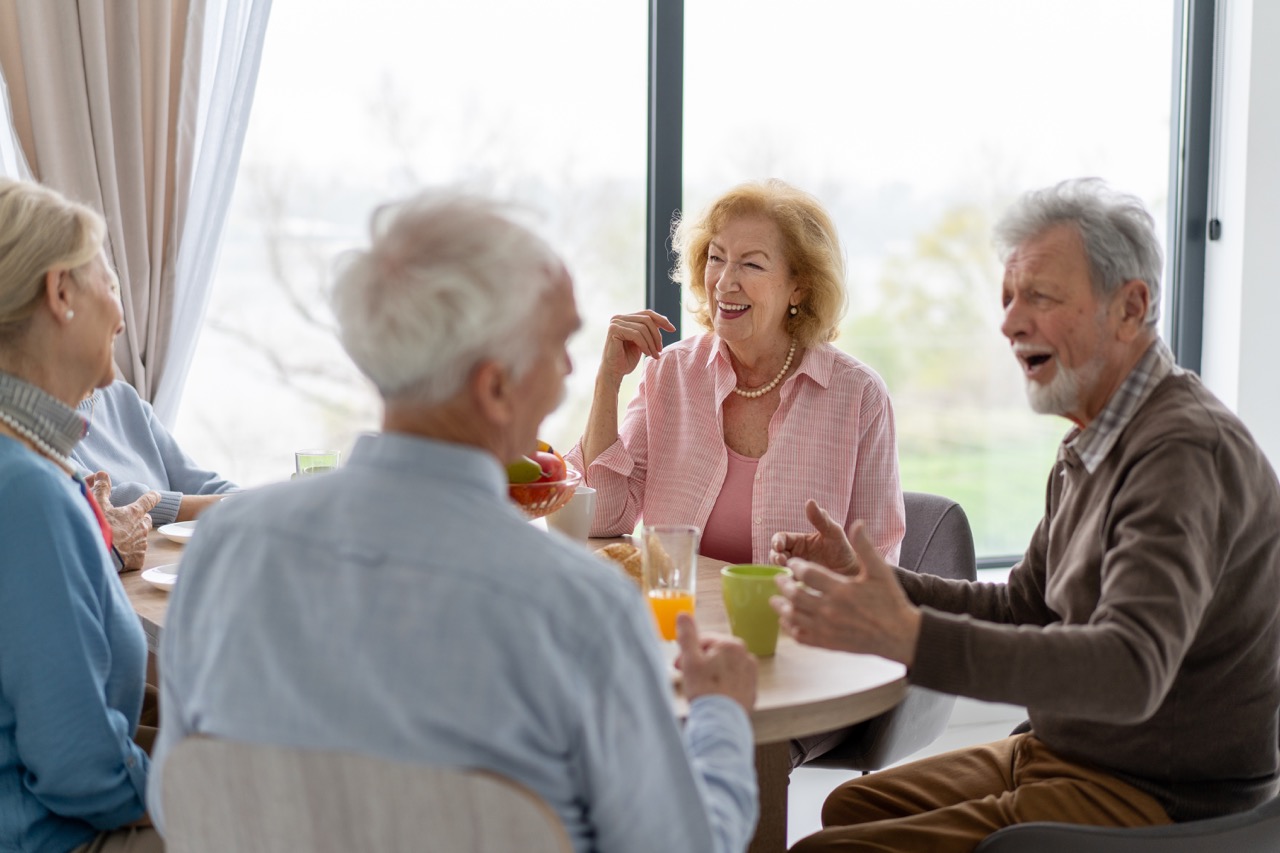 Joyful Gathering of Seniors Experiencing Shared Moments